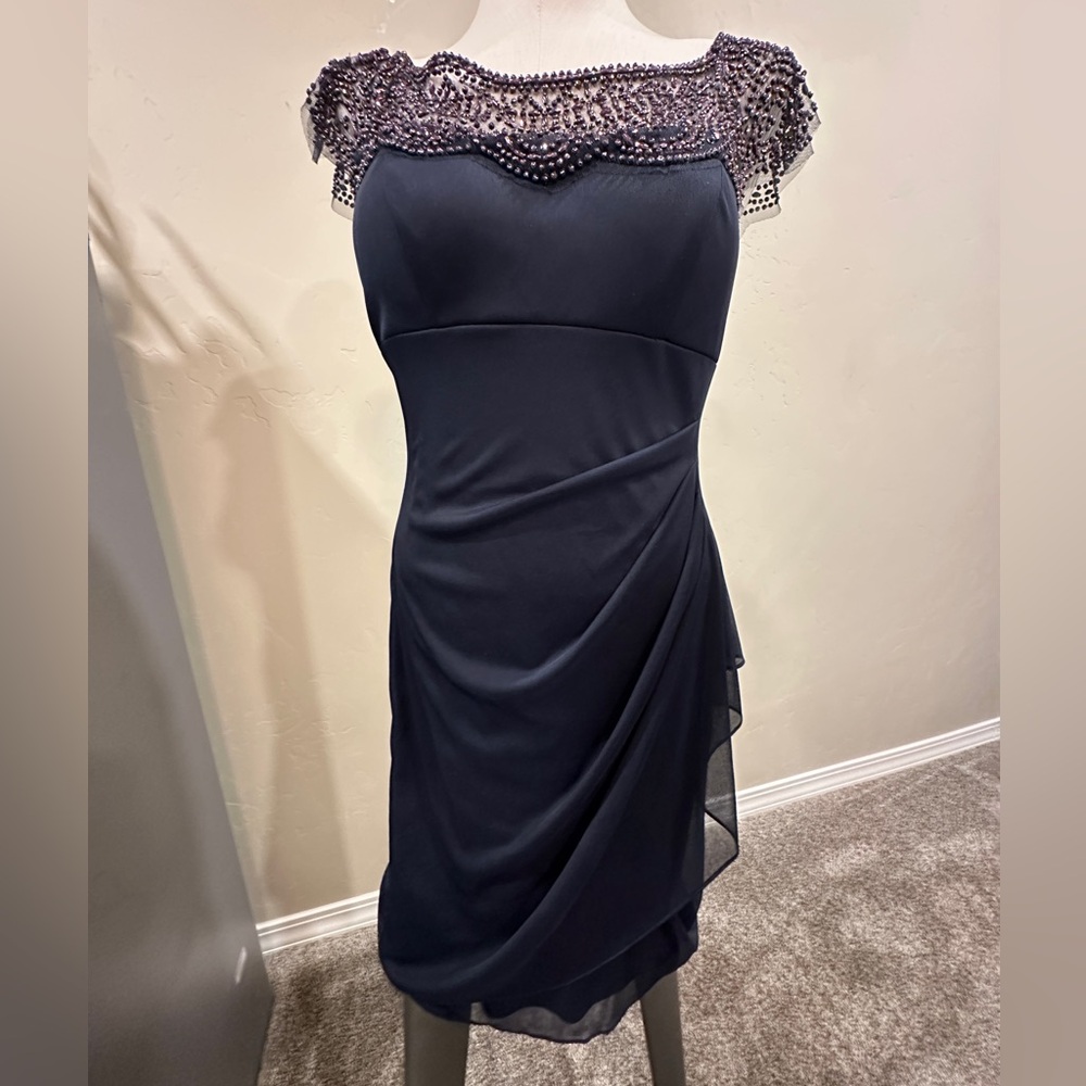 XSCAPE Formal dress. Dark blue. Beaded top and sleeves. Chiffon bottom.